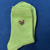 Chaussettes à paillettes coeur léopard