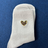Chaussettes à paillettes coeur léopard