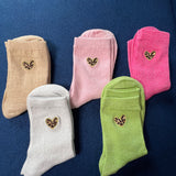 Chaussettes à paillettes coeur léopard