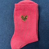 Chaussettes à paillettes coeur léopard
